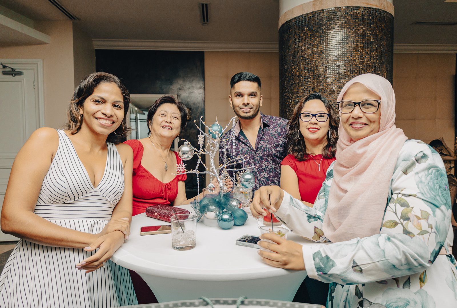 Guests gathered around a table at a celebration