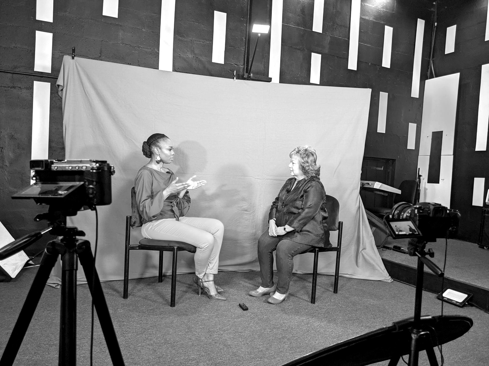 A two-person green screen interview filmed on two cameras